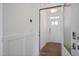 Bright entryway with hardwood floors and white wainscoting at 148 Charlotte Knoll St # 8, Zebulon, NC 27597