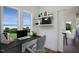 Bright home office features built-in shelving and a view of the backyard at 148 Charlotte Knoll St # 8, Zebulon, NC 27597