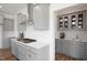 Gray kitchen cabinets, stainless steel appliances, and a butlers pantry at 148 Charlotte Knoll St # 8, Zebulon, NC 27597