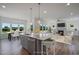 Open concept kitchen with large island and stainless steel appliances at 148 Charlotte Knoll St # 8, Zebulon, NC 27597