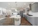 Gourmet kitchen with gray cabinets and large island at 148 Charlotte Knoll St # 8, Zebulon, NC 27597