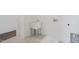 Convenient laundry room with utility sink and flooring at 148 Charlotte Knoll St # 8, Zebulon, NC 27597