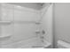 Bathroom featuring a shower/tub combo and shelving at 178 Charlotte Knoll St # 9, Zebulon, NC 27597