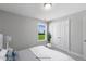 Bedroom with a view and neutral decor at 178 Charlotte Knoll St # 9, Zebulon, NC 27597