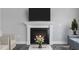 Modern fireplace with white mantel and dark insert at 178 Charlotte Knoll St # 9, Zebulon, NC 27597