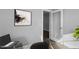 Bright home office with large window and view to hallway at 178 Charlotte Knoll St # 9, Zebulon, NC 27597
