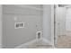 Convenient laundry room with hookups and shelving at 178 Charlotte Knoll St # 9, Zebulon, NC 27597
