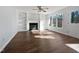 Spacious living room featuring hardwood floors and a fireplace at 118 Trafalgar Ln, Cary, NC 27513