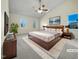 Virtually staged main bedroom with large windows and high ceilings at 118 Trafalgar Ln, Cary, NC 27513