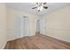 Bedroom showing hardwood floors, closet space, and natural light at 1219 Carlton Ave, Burlington, NC 27217
