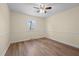 Bedroom featuring hardwood floors and a single window at 1219 Carlton Ave, Burlington, NC 27217