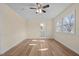 Sun-filled bedroom with hardwood floors and an attached bathroom at 1219 Carlton Ave, Burlington, NC 27217