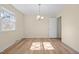 Elegant dining room with hardwood floors and a chandelier at 1219 Carlton Ave, Burlington, NC 27217