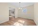 Bright dining room featuring hardwood floors and a chandelier at 1219 Carlton Ave, Burlington, NC 27217