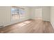 Bright living room filled with sunlight and hardwood floors at 1219 Carlton Ave, Burlington, NC 27217