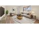 Sun-filled living room featuring contemporary furniture, hardwood floors, and large windows at 1219 Carlton Ave, Burlington, NC 27217