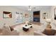 Bright living room featuring a brick fireplace, built-in shelving, and stylish furnishings at 1219 Carlton Ave, Burlington, NC 27217