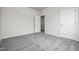 Spacious bedroom with gray carpet and double closets at 14 E Victory View. Ter, Smithfield, NC 27577