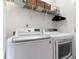 Convenient laundry room with LG washer and dryer, and shelving at 15 Madeira Dr, Franklinton, NC 27525