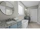 Elegant bathroom with a freestanding tub and granite countertops at 15 Willow Bend Dr, Youngsville, NC 27596