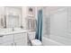 Clean bathroom with a bathtub and shower at 161 Holton St, Smithfield, NC 27577