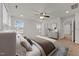 Large bedroom with plush carpeting, ceiling fan, and multiple windows for ample light at 1700 Cary Reserve Dr, Cary, NC 27519