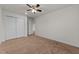 Spacious bedroom with double doors and carpet at 1700 Cary Reserve Dr, Cary, NC 27519