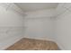 Empty walk-in closet with wire shelving, offering plenty of storage space at 1700 Cary Reserve Dr, Cary, NC 27519
