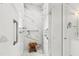 Spa-like bathroom with walk-in shower and marble tile at 202 Dundas Ln, Raleigh, NC 27603