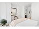 Bedroom with built-in closets and a mirrored wall at 202 Dundas Ln, Raleigh, NC 27603