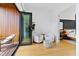 Bedroom with private balcony access and two comfy armchairs at 202 Dundas Ln, Raleigh, NC 27603