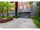 Modern townhome with private driveway and landscaping at 202 Dundas Ln, Raleigh, NC 27603