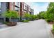 Modern townhomes with attached garages and landscaping at 202 Dundas Ln, Raleigh, NC 27603