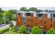 Contemporary townhomes with wood and metal siding at 202 Dundas Ln, Raleigh, NC 27603