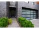 Modern exterior with dark brick and a glass garage door at 202 Dundas Ln, Raleigh, NC 27603