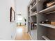Bright hallway with built-in shelving and storage at 202 Dundas Ln, Raleigh, NC 27603