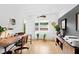 Modern home office with wood desk and built-in storage at 202 Dundas Ln, Raleigh, NC 27603
