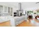 Modern kitchen with marble island and breakfast bar at 202 Dundas Ln, Raleigh, NC 27603