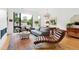Spacious living room with hardwood floors and large windows at 202 Dundas Ln, Raleigh, NC 27603