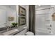 Clean bathroom with a tub, shower, and gray vanity at 2326 Sugar Cone Way, Fuquay Varina, NC 27526