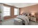 Bedroom with a butterfly wall and a cozy sitting area at 2326 Sugar Cone Way, Fuquay Varina, NC 27526
