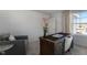 Home office with a large desk and comfortable seating at 2326 Sugar Cone Way, Fuquay Varina, NC 27526