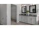 Double vanity bathroom and walk-in closet at 2330 Sugar Cone Way, Fuquay Varina, NC 27526