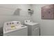 Laundry room with side-by-side washer and dryer and a shelf at 2330 Sugar Cone Way, Fuquay Varina, NC 27526