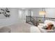 Spacious loft area with plush seating, providing extra living space at 2330 Sugar Cone Way, Fuquay Varina, NC 27526