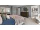 Main bedroom with ensuite bathroom and large dresser at 2330 Sugar Cone Way, Fuquay Varina, NC 27526