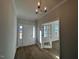 Bright foyer with wood flooring and a view into an adjacent room at 25 Accord Dr, Youngsville, NC 27596