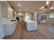 Modern kitchen with a large island, stainless steel appliances, and an open layout at 25 Accord Dr, Youngsville, NC 27596