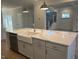 Close up on kitchen island featuring sink, countertop, and cabinets at 25 Accord Dr, Youngsville, NC 27596