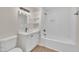 Modern bathroom with white vanity, subway tile shower, and black fixtures at 2538 Gemena Rd, Chapel Hill, NC 27516